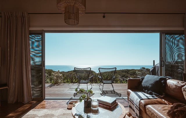 A balcony with a wide entryway.