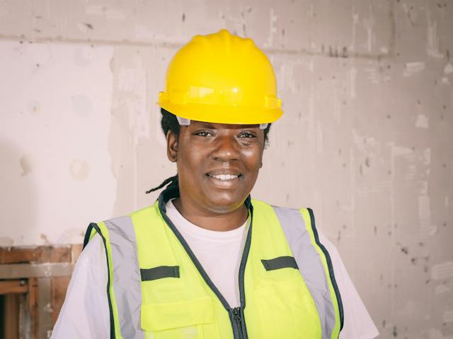 A contractor smiling at the camera.